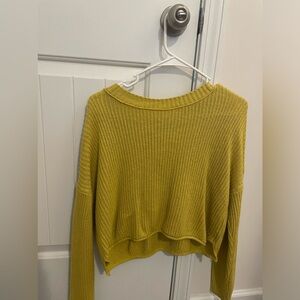 Large mustard yellow sweater never worn.